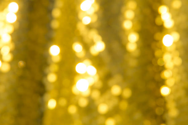 istock Golden holiday festive bokeh background 874970136
