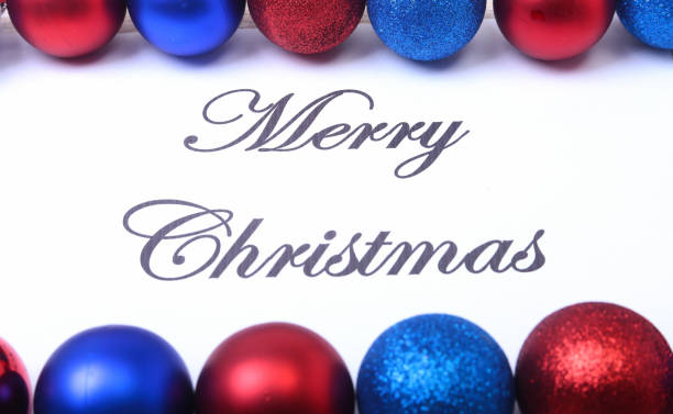 istock Text merry christmas on paper with many balls 874975706