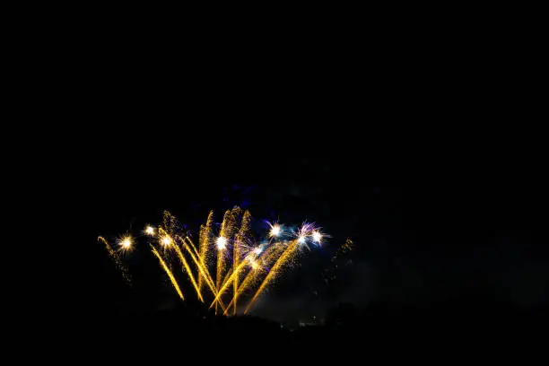 Fantastic fireworks display  with blue and orange colours