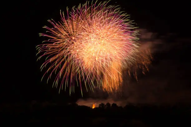 Colourful giant fireball of several hundred meters at fantastic fireworks display in Germany