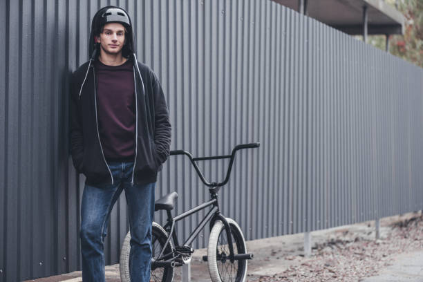 istock bmx biker on street 874987138
