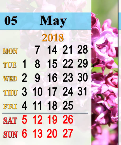 istock calendar for May 2018 with lilac branch 874991530