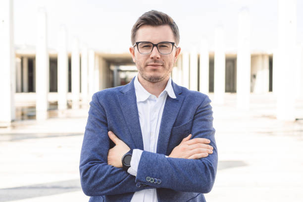 istock Stylish business man in a suit 874991888