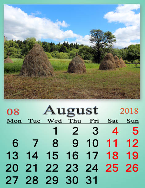 istock calendar for August 2018 with stacks in village 874994760