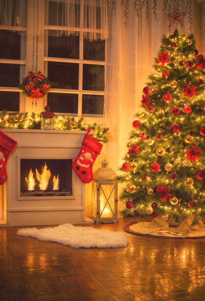 istock Christmas Tree Near Fireplace at Home 875000826