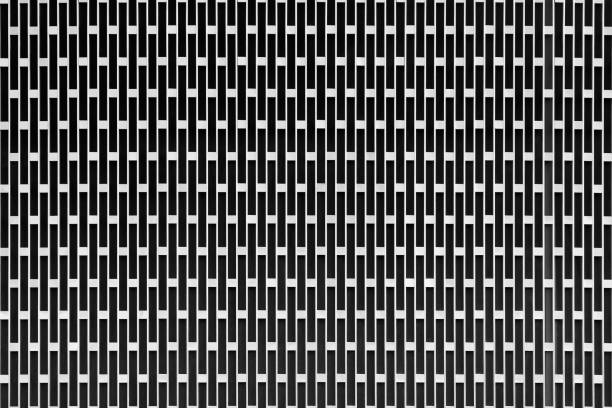 Background in the form of a metal surface with rectangular holes as a place for placing text