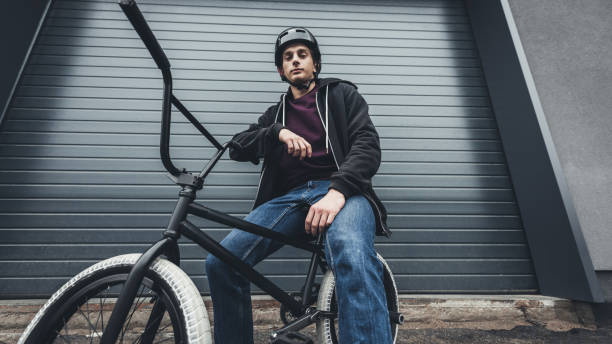 istock bmx biker on street 875007496