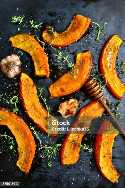 Oven Baked Pumpkin Slices Stock Photo - Download Image Now - Roasted, Pumpkin, Squash - Vegetable