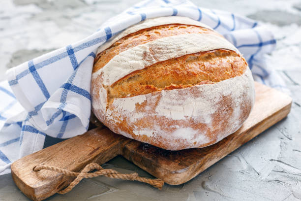 istock Homemade wheat bread and linen napkin. 875016816