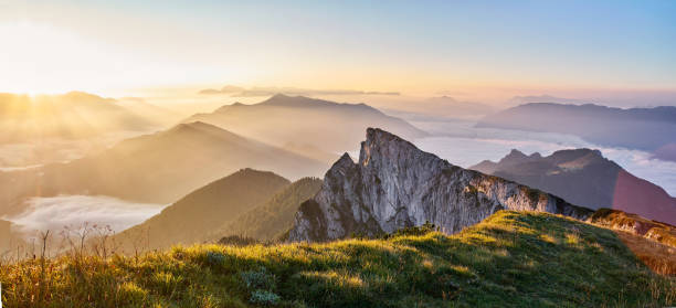 istock Amazing sunrise in mountains 875021670