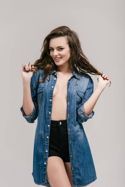 istock seductive girl in denim shirt 875024872