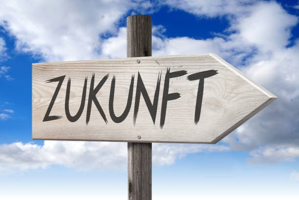 Zukunft (German)/ Future (English) - wooden signpost with one arrow Zukunft (German)/ Future (English) - wooden signpost with one arrow. 

 zukunft stock pictures, royalty-free photos & images