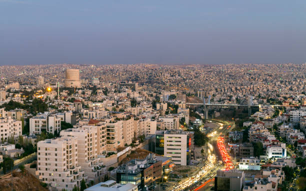 istock Amman mountain and abdoun bridge with traffic jam at evening 875025850
