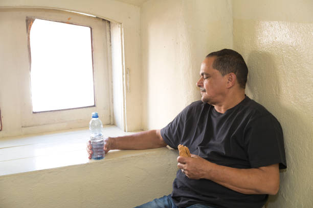 istock Poor northeastern brazilian man in a very simple hotel 875028598