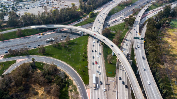 istock Aerial view of a freeway intersection in Los Angeles 875028974