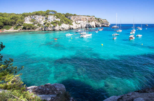 istock Boats and yachts on Macarella beach, Menorca, Spain 875031230