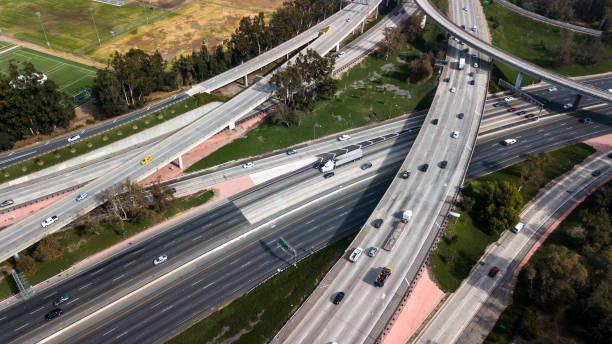 istock Aerial view of a freeway intersection in Los Angeles 875031388