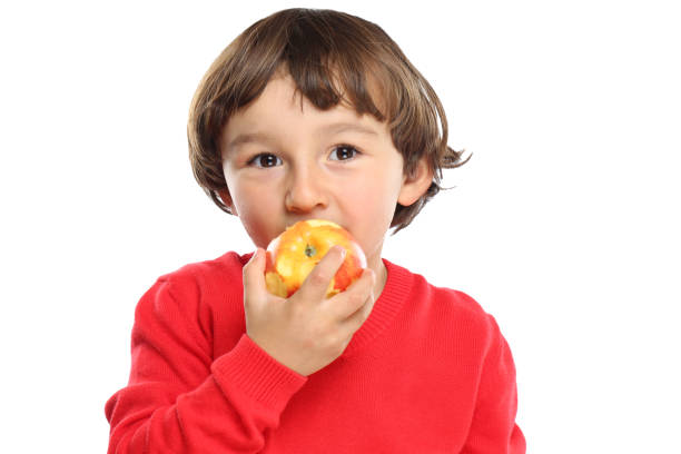 Apple eating child kid fruit healthy isolated on a white background