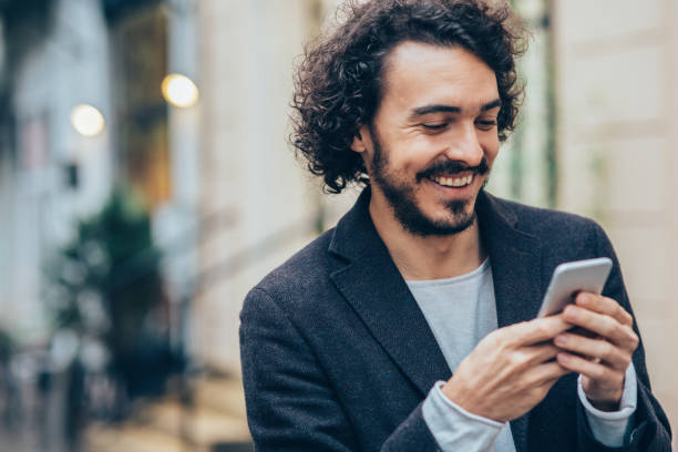 istock Man texting in the city 875053336