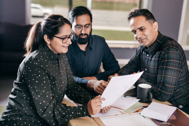 istock Couple and financial advisor 875053476