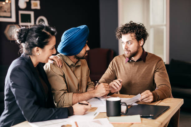 istock Financial advisor giving at home professional consultation 875053480