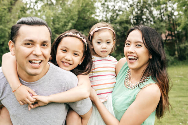 istock Happy family having fun outdoor 875053624