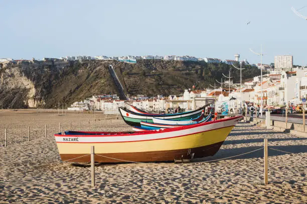 Photo of Traditional boat on the beach of Nazare in Portugal