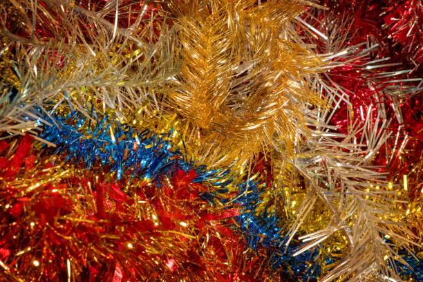 istock Large bright colorful christmas tinsel heap 875060746