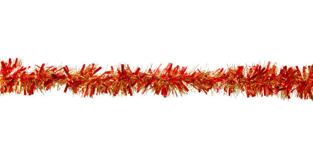 istock Red and golden christmas tinsel decoration isolated 875060770