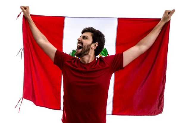 istock Peruvian Fan / Sport Player celebrating on white background 875074218