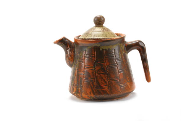 istock Antique stone tea pot on a white background 875088130