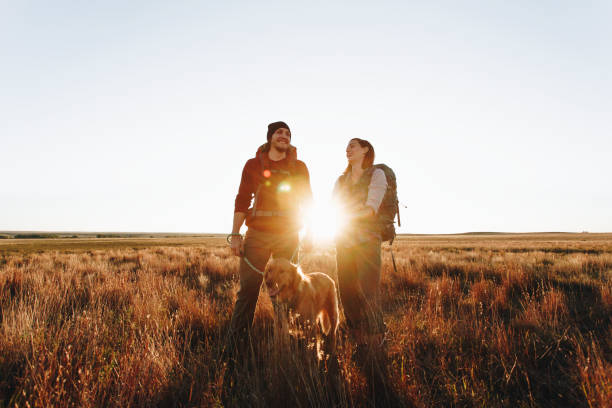 istock Couple hiking together in the wilderness 875090522