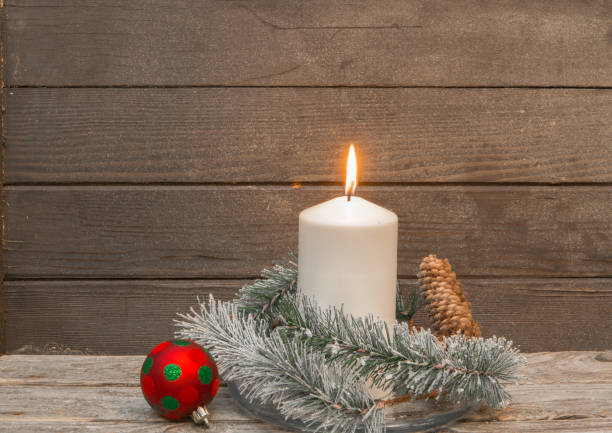 istock candle with christmas ball 875090650