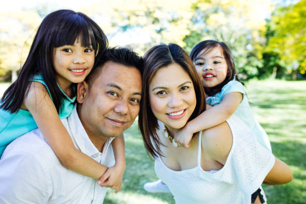 istock Happy family of four 875097202