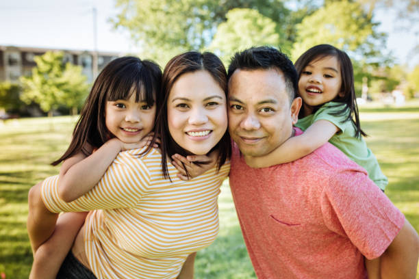 istock Happy family of four 875097210