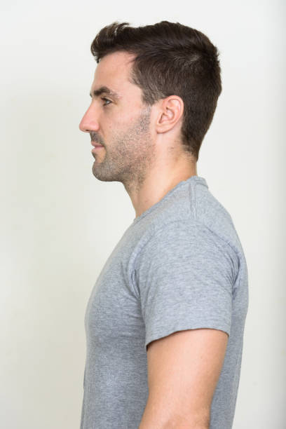 istock Handsome muscular man wearing gray shirt against white background 875106932