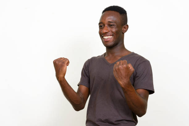 istock Young African man wearing brown shirt against white background 875113698