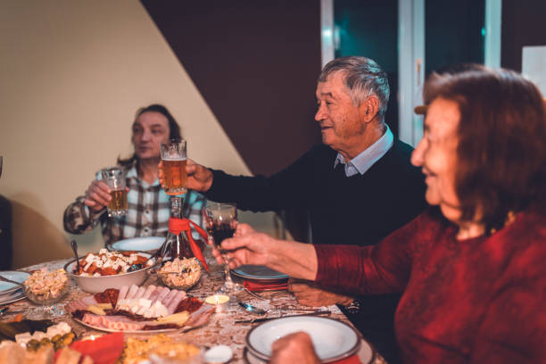 istock Family having a lunch and celebrating holidays 875114562