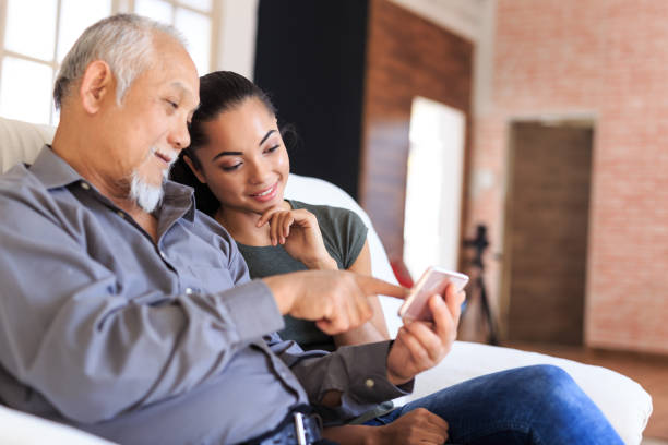 istock Family at home using smart phone 875114584