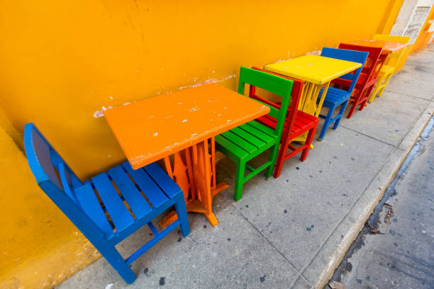 istock Colorful chairs and tables 875117090