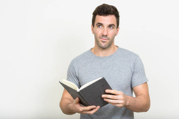 istock Handsome muscular man wearing gray shirt against white background 875117148