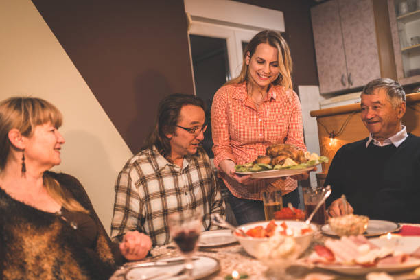 istock Family enjoying a lunch during holidays 875120430