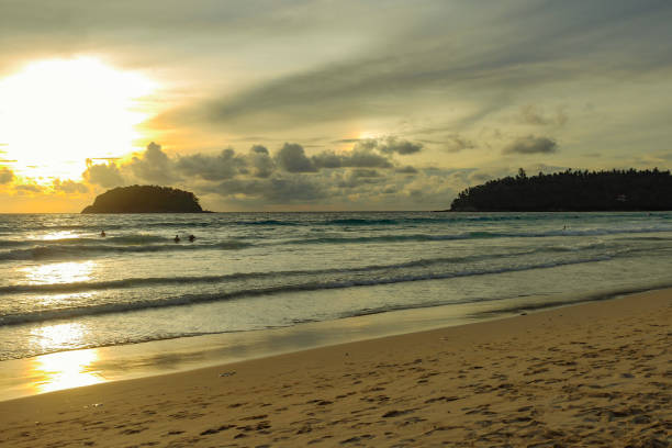 istock Beautiful beach at evening The sun is setting Beautiful sky Perfect for sunbathing, swimming, reading, a small island in the middle of the sea. 875120834
