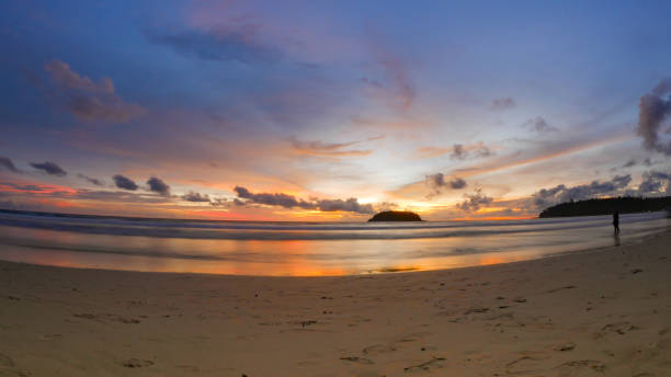 istock beautiful beach with twilight cloudy sky in the evening. 875120858