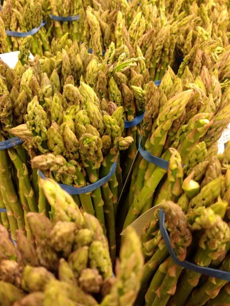 istock Bundles of Asparagus 875121354