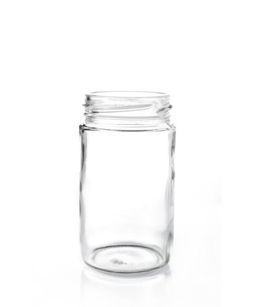 istock clear glass jar without lid on white isolate background, good for food or storage concept 875124842