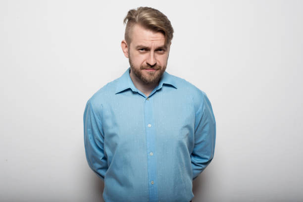 istock Handsome young man in a blue shirt 875128148