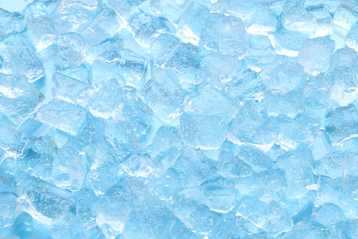 winter clear blue ice cube texture background