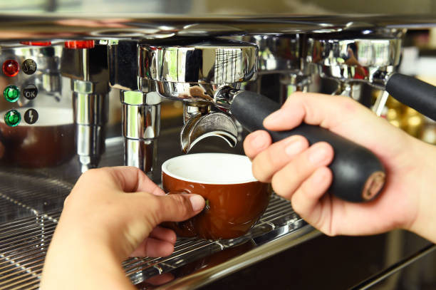 istock close up of coffee machine preparing 875151040