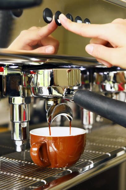 istock close up of coffee machine preparing 875151084